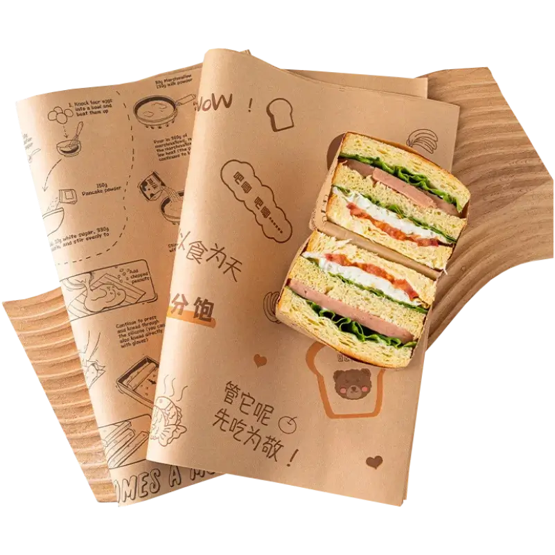 A sliced sandwich placed on custom-printed kraft paper featuring cool illustrations and text designs