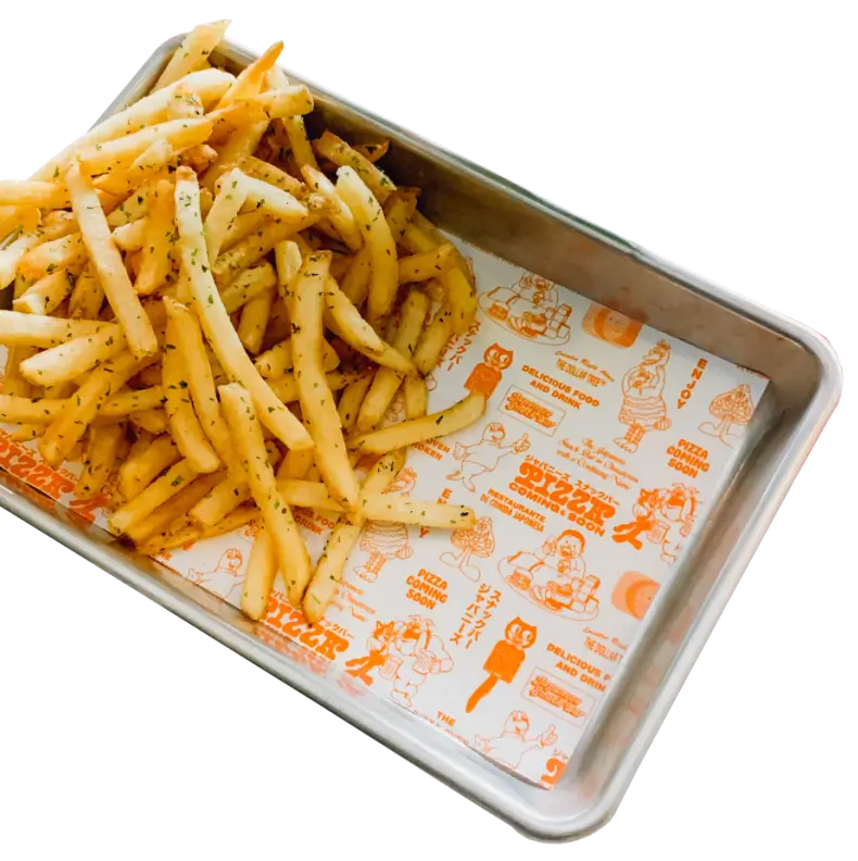 Custom printed parchment paper with fries placed in a tray