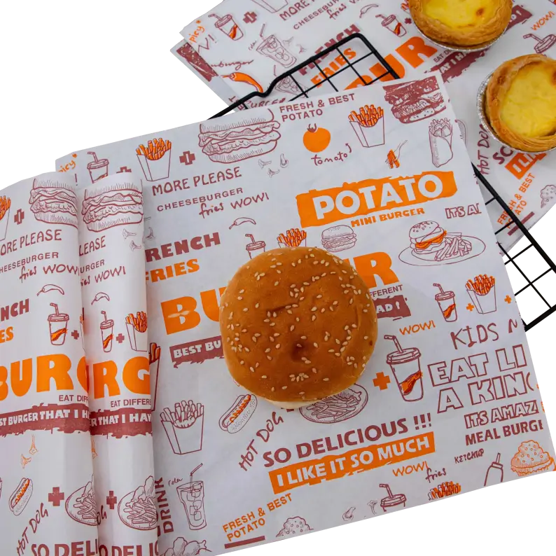 Burger and egg tarts placed on custom-printed parchment paper with vibrant illustrations and food-themed text designs