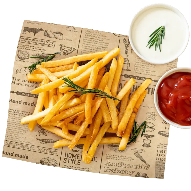 Fries on custom printed greaseproof paper with sauce bowls