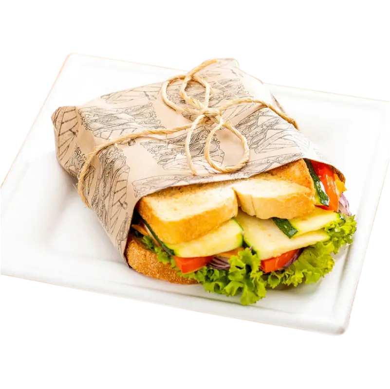 Custom printed sandwich paper wrapped around a sandwich, placed on a plate