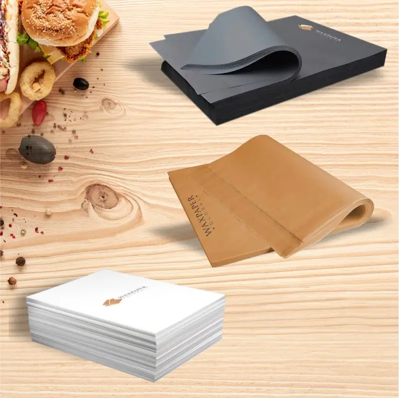 Custom printed wax paper in white, brown, and black, featuring the Wax Paper Global logo, placed alongside food items on a table, designed for food presentation and packaging