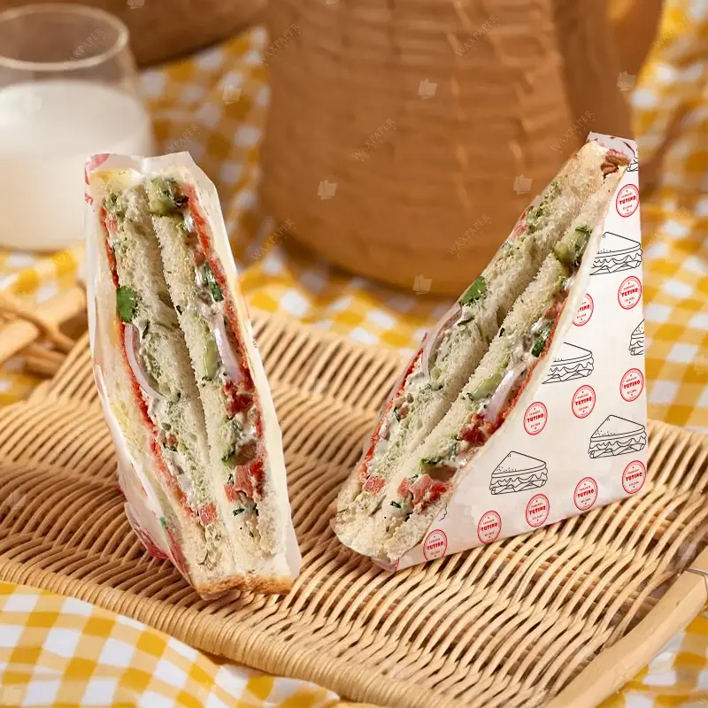 Sandwich wrapped in dry waxed custom printed sandwich paper with Tutino logo